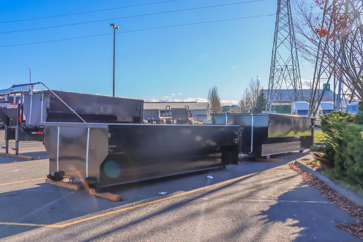 Roll-off dumpster ready for waste disposal at job site for 2 Yard Dumpster Rental in Rothschild